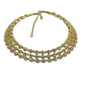 Elegant gold multi-layer rhinestone choker necklace with sparkling crystals on white background