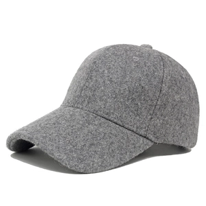 Close-up of grey wool baseball cap showing premium fiber texture and structured panels