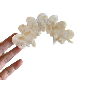 Elegant French acetate flower petal hair claw clip with beige marble texture design