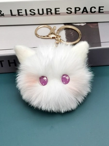 White plush cat ball keychain with large purple eyes and golden lobster clasp