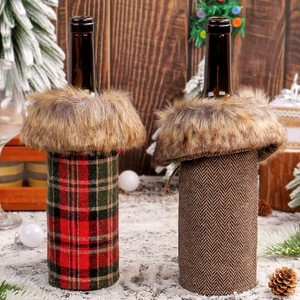 Christmas wine bottle covers in red plaid and herringbone pattern with faux fur collar