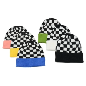 Checkerboard knit beanies in various colors with ribbed cuff for winter warmth