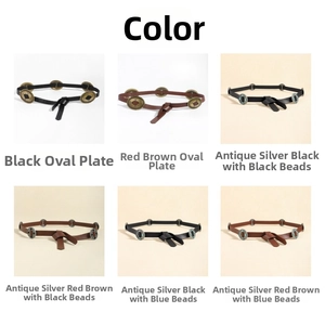 Detail view of vintage waist belts with antique silver frames and brass oval discs