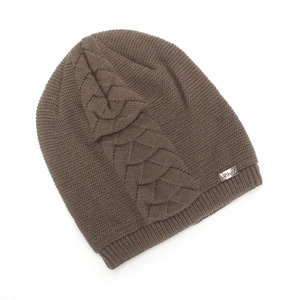 Close-up of brown cable knit beanie showing thick texture and metal Heat logo tag