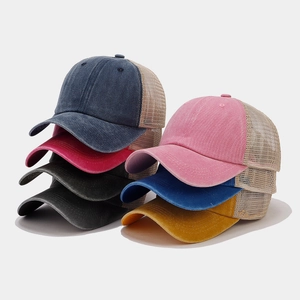 Vintage washed mesh baseball cap collection in navy, pink, black, blue, and yellow colors