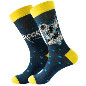 Detail of dark blue space socks featuring astronaut playing guitar and Rock In Space text