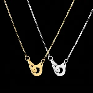 Polished stainless steel interlocking handcuff pendant necklaces in gold and silver