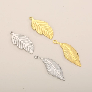 Set of four stainless steel feather pendants in gold and silver finishes for DIY jewelry