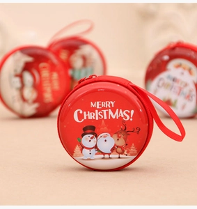 Detail of red round Christmas coin purse with snowman and Santa Claus print