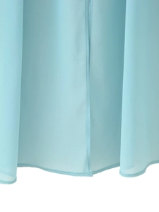 Detailed close-up of light blue chiffon fabric showing delicate hem stitching and texture