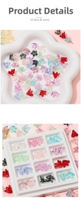 Macro detail of assorted colorful glass lily flower beads organized in a white plastic tray