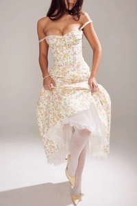 Detail of French floral dress showing lace trim hem and delicate summer flower patterns