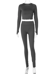 Close-up of charcoal grey yoga set featuring high-elastic long sleeve top and leggings