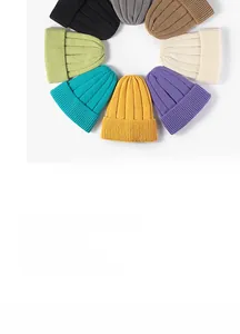Close-up of knit hats showing detailed ribbed texture and multiple color options