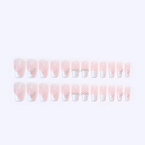 Pink and white gradient press-on nails with pearl and gold bead accents, 24-piece set