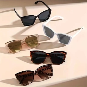 Chic oversized cat-eye sunglasses collection in black, white, and tortoiseshell frames