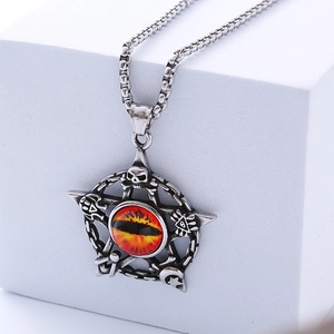 Gothic punk silver skull necklace with pentagram and orange cat eye stone on white stand