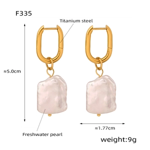 Detail view of titanium steel earrings with irregular freshwater pearls and dimensions