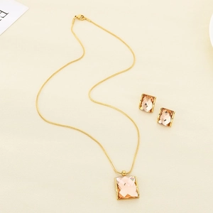 Golden stainless steel jewelry set with square champagne gems including necklace and studs