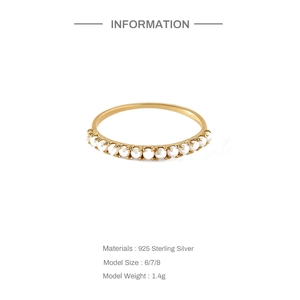 Detail view of 925 sterling silver ring with delicate pearls and specifications