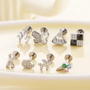 F136 titanium piercing jewelry set with cz studs in butterfly and crown designs