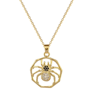 Elegant gold spider pendant necklace featuring pavé crystals and sparkling rhinestones