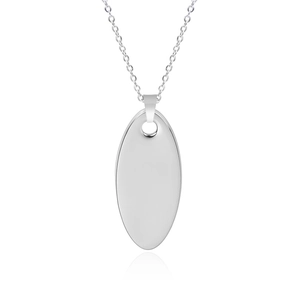 Macro shot of polished oval stainless steel pendant with silver finish on a fine chain