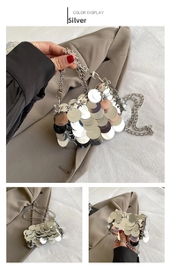 Detail of silver sequin crossbody bag with metallic chain strap for party fashion