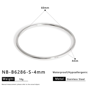Polished stainless steel bangle detail showing 60mm diameter and 4mm width parameters