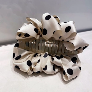 Polka dot oversized cloud hair claw clip in beige satin fabric with black dots