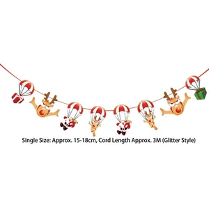 Detail of glitter Christmas banner with Santa and reindeer shapes on a 3M red white string
