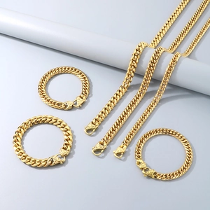 Detailed set of polished golden Cuban link necklaces and bracelets for men on light background
