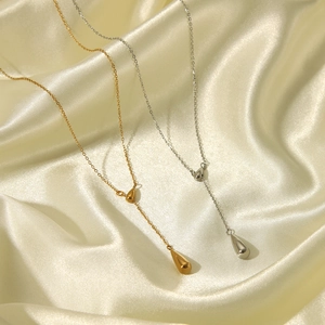 Minimalist 18K gold and silver plated stainless steel water drop necklaces on silk