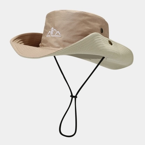 Detail of hiking hat with mountain embroidery, side snap buttons, and windproof chin strap