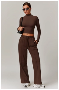 Deep brown high-waisted wide leg sweatpants with matching slim crop top sweatshirt
