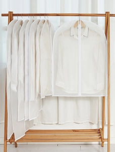 Detail of PEVA dust covers in two lengths featuring center zipper and hangers