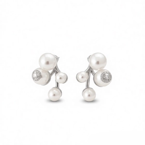 Elegant silver branch flower earrings with white pearls in a modern minimalist style