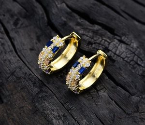 Detailed view of S925 silver hoop earrings with multicolored gemstones and S925 hallmark