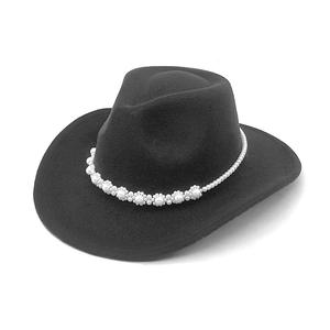 Detail of black wool fedora hat featuring a decorative white pearl beaded floral band