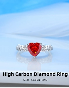 Macro shot of S925 silver ring featuring heart-cut pink sapphire carbon diamond details