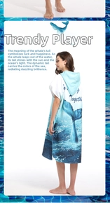 Detail of microfiber beach poncho featuring a blue gradient whale tail and Together text
