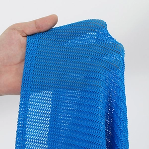 Close-up of bright blue mesh fabric featuring a V-shaped weave pattern for swimwear