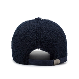 Rear view of navy blue teddy fleece baseball cap with adjustable metal strap buckle