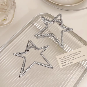 Chic silver hollow star hair claw clips with hammered metal texture for Y2K styling