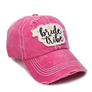 Distressed rose red cotton baseball cap featuring bride TRIBE embroidery and washed finish