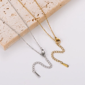 Detail of 304 stainless steel necklace chains in gold and silver with S.STEEL hallmark