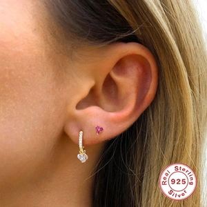 Elegant 925 sterling silver four-leaf clover stud earrings with sparkling crystals
