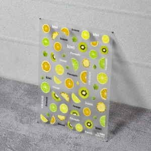 Translucent fruit nail art stickers with lemon and kiwi designs for fresh summer manicure