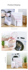 Close-up of white mesh laundry bags with pink zippers and cylindrical bra protector wash bag