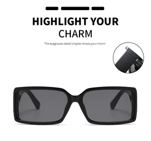 Close-up of retro wide-frame sunglasses showing the hinge construction and lens detail